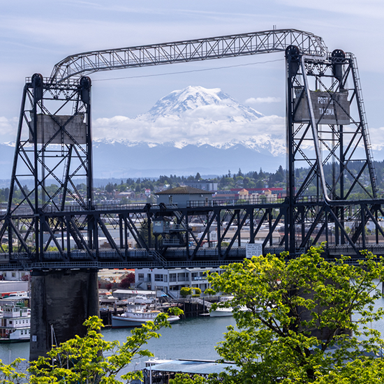 Historic lift bridge frames Mount Rainier over the South Sound waterfront.