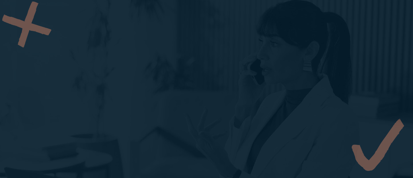 Woman using a mobile device with a checkmark and X icons representing fraud awareness and online security.